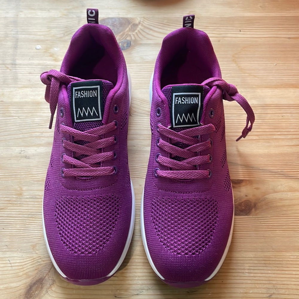 Size 9 Women’s purple athletic shoes, never been worn.